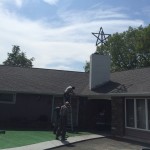 guys working on a house roof