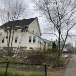 Back of house with new shingles