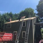 Crew working on a roof replacement